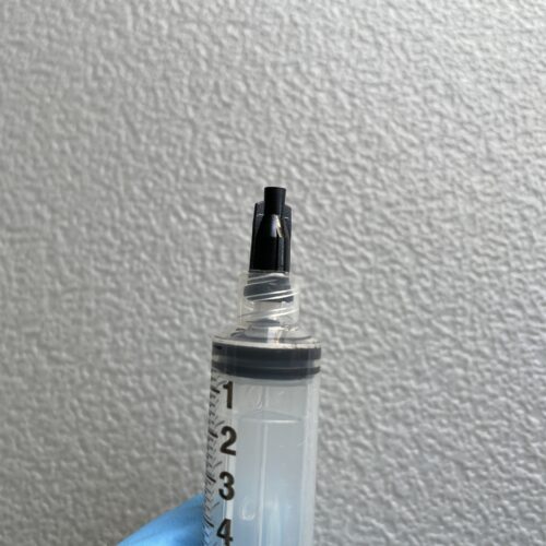 Cap on syringe